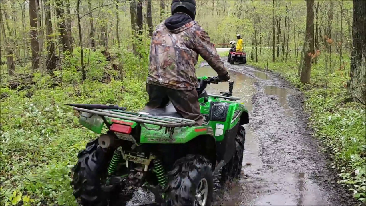 ATV Muddy Trail Riding With Lots Of Water.