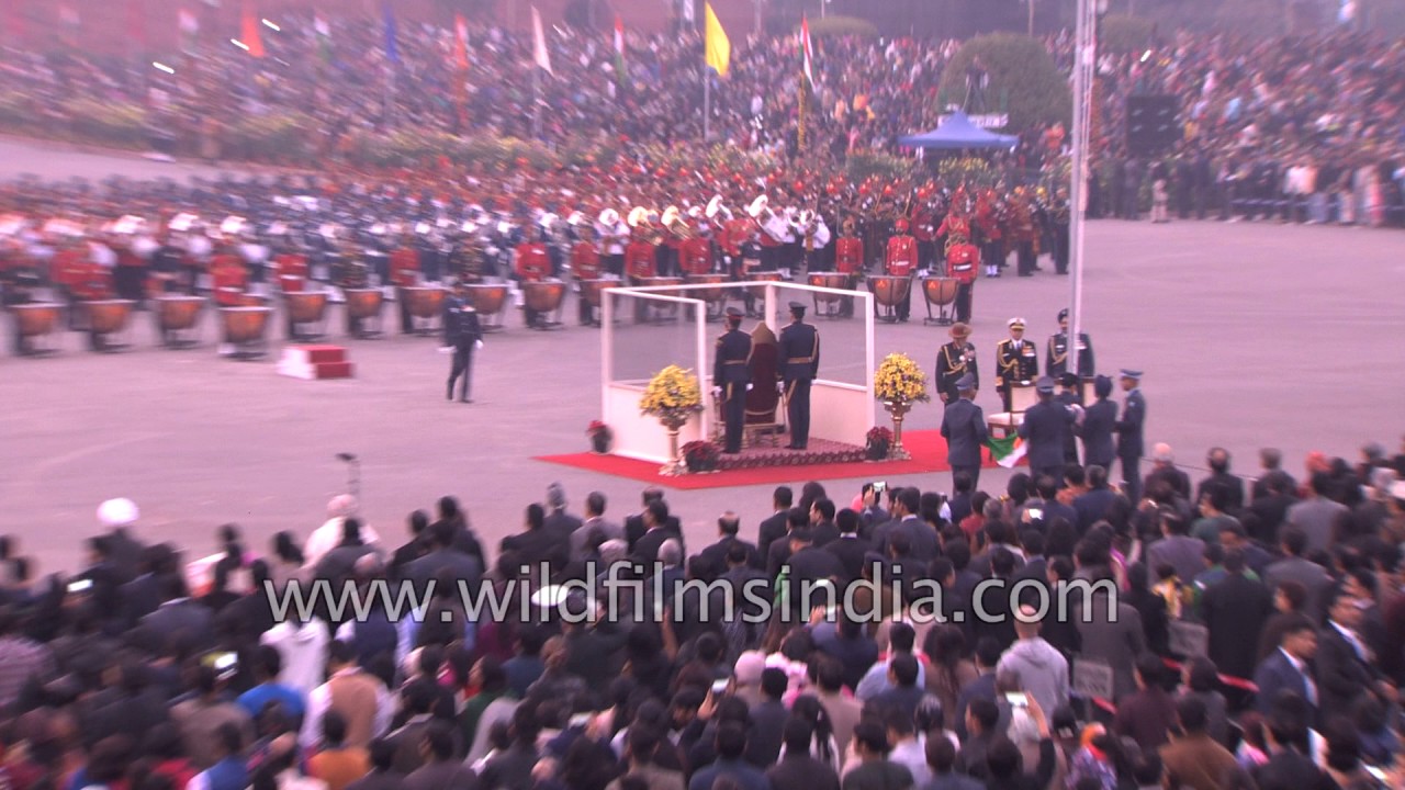 Indian Air Force officers bring down the Indian flag at the the end of the Beating Retreat ceremony