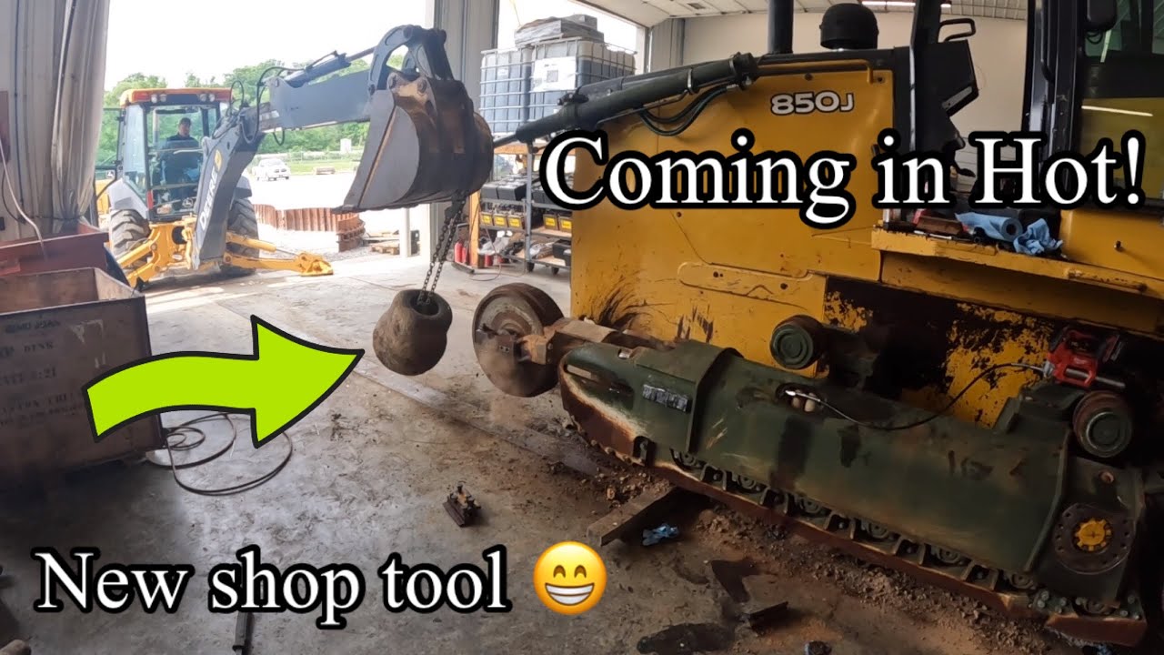 Full undercarriage change on Deere 850J gets real interesting @C_CEQUIPMENT