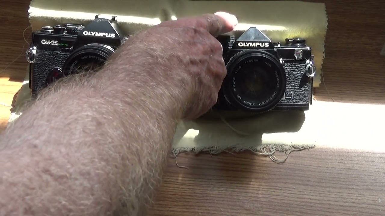 Comparing Olympus OM-2n and OM-2 Spot Program cameras