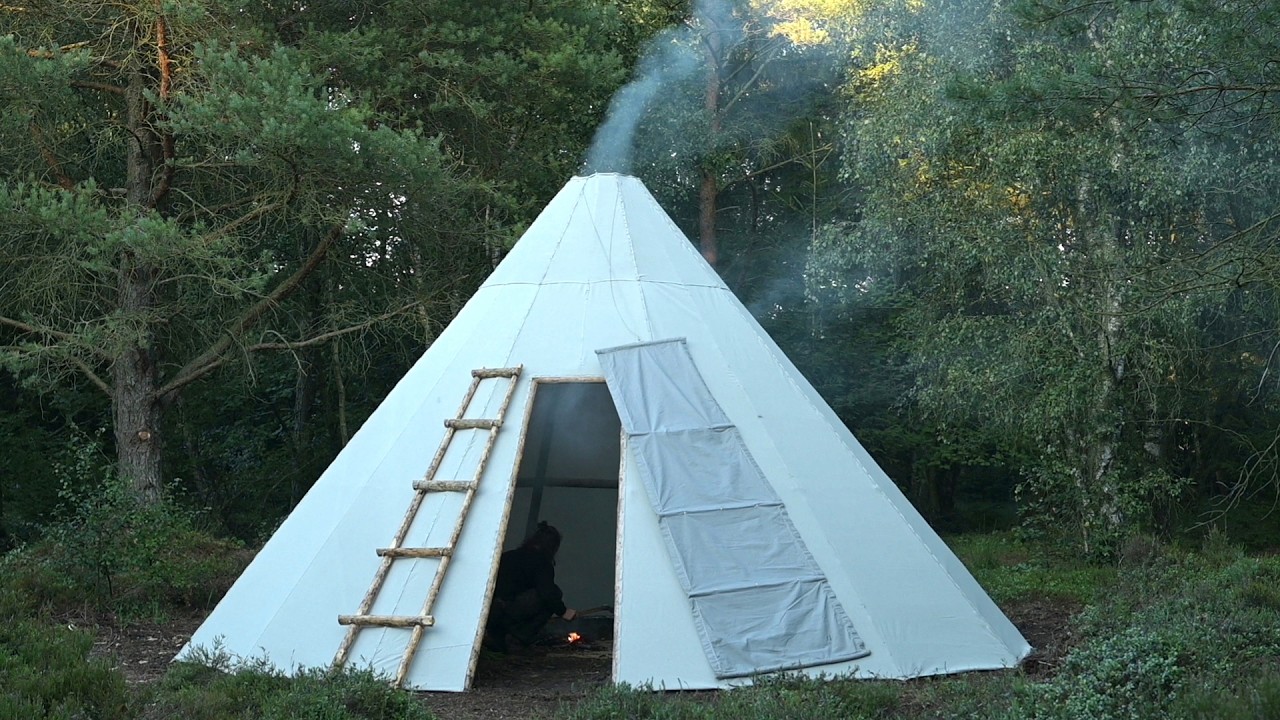 Making tipi from poles, cord, nails and canvas fabric - bushcraft basecamp