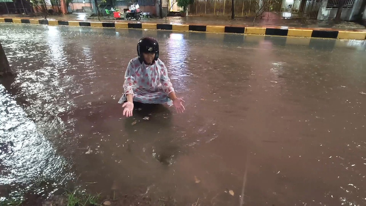 Drain rain water on the street road after heavy rainstorm