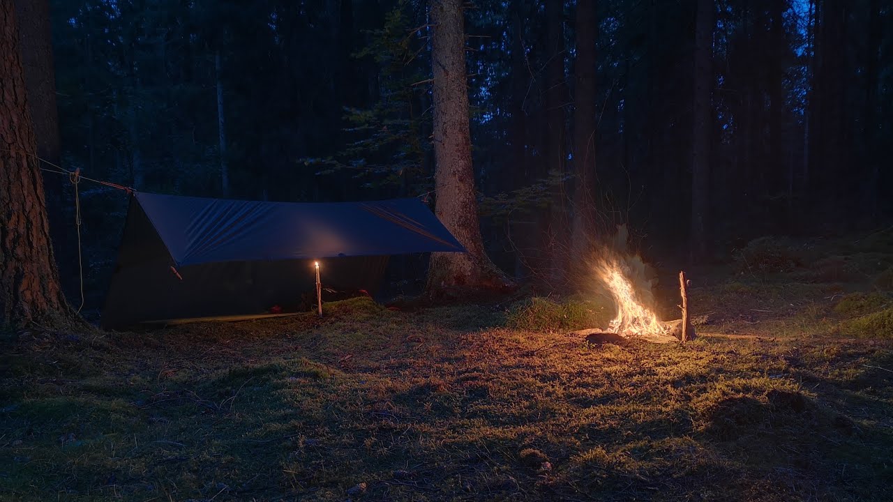 Bushcraft solo overnight in the forest | Tarp shelter, heavy rain, making candlestick