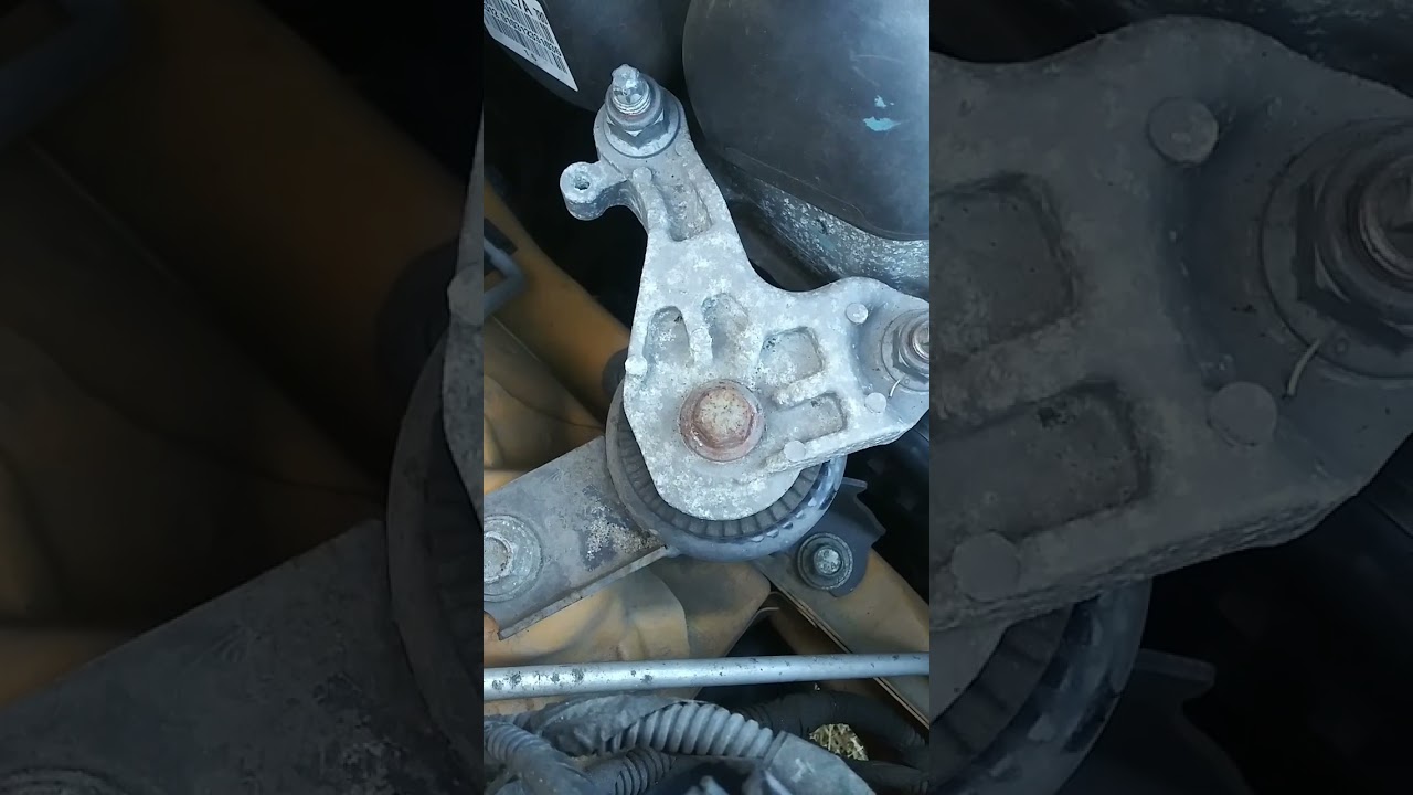 how to change 2011 Ford Fiesta top motor mount