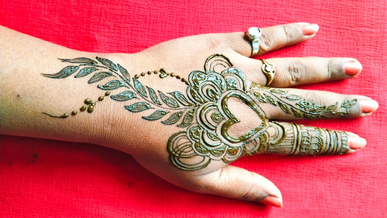 Back hand heart mehndi design || Leaf mehndi design #mehndi #henna #leafmehndi @Madhumitacreation 
