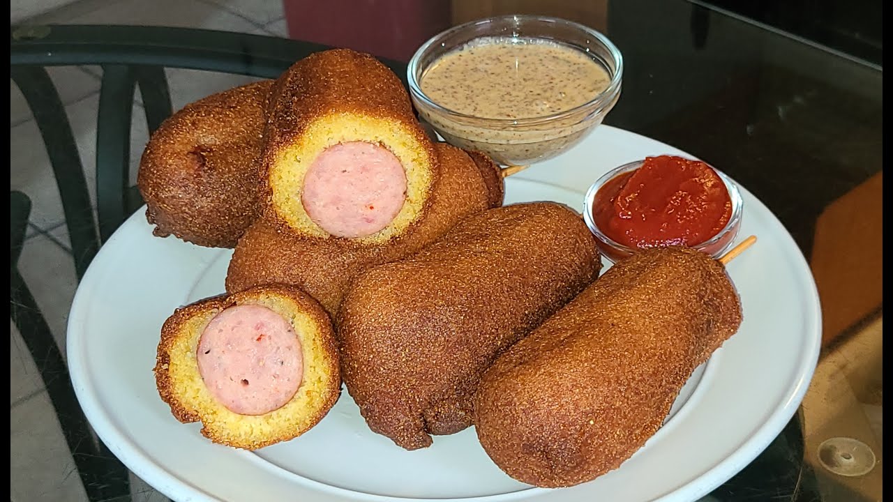 How to make Andouille Sausage Corn dogs with Spicy Honey Mustard and Ketchup dipping sauces.