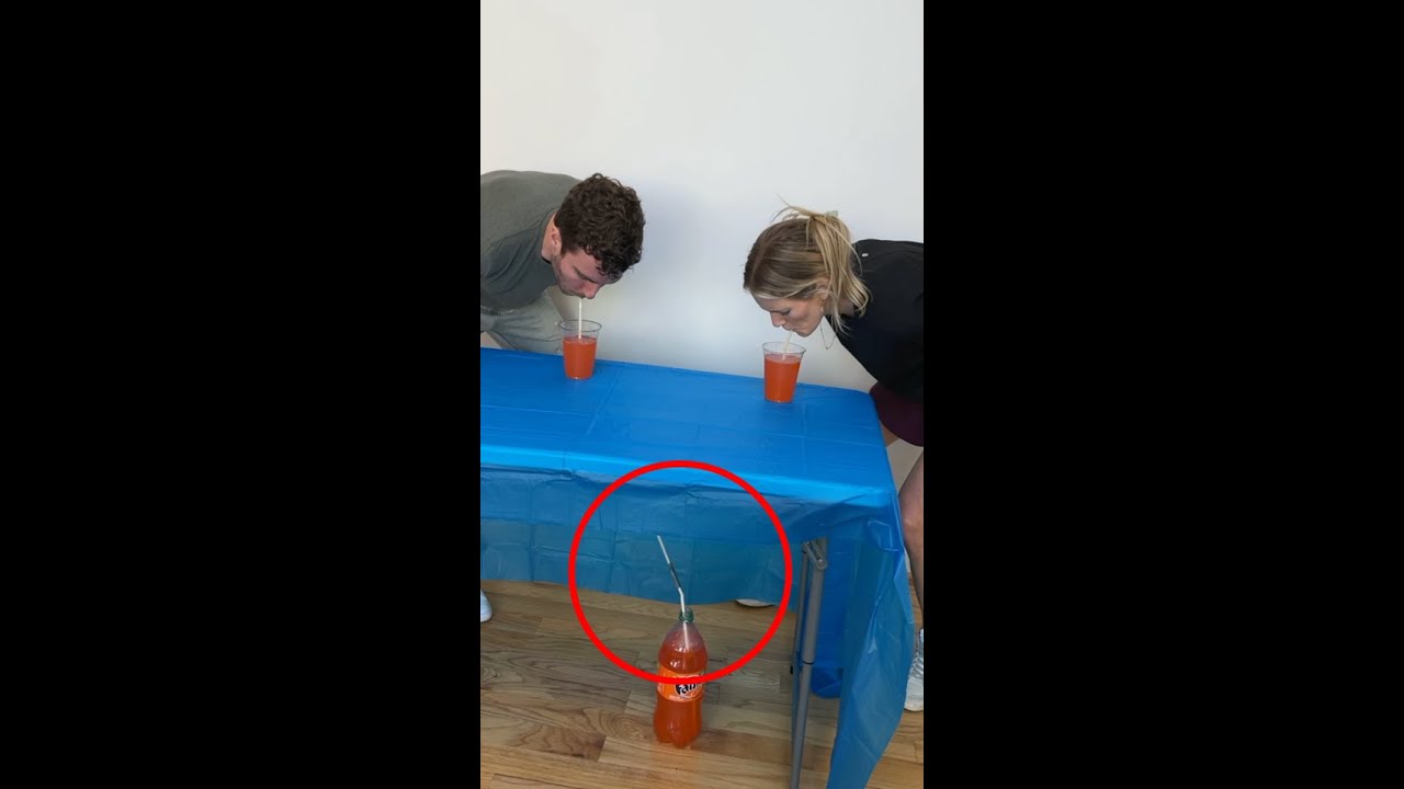 Guy pranks girl in drinking challenge with extra long straw! 😂 (shortened)