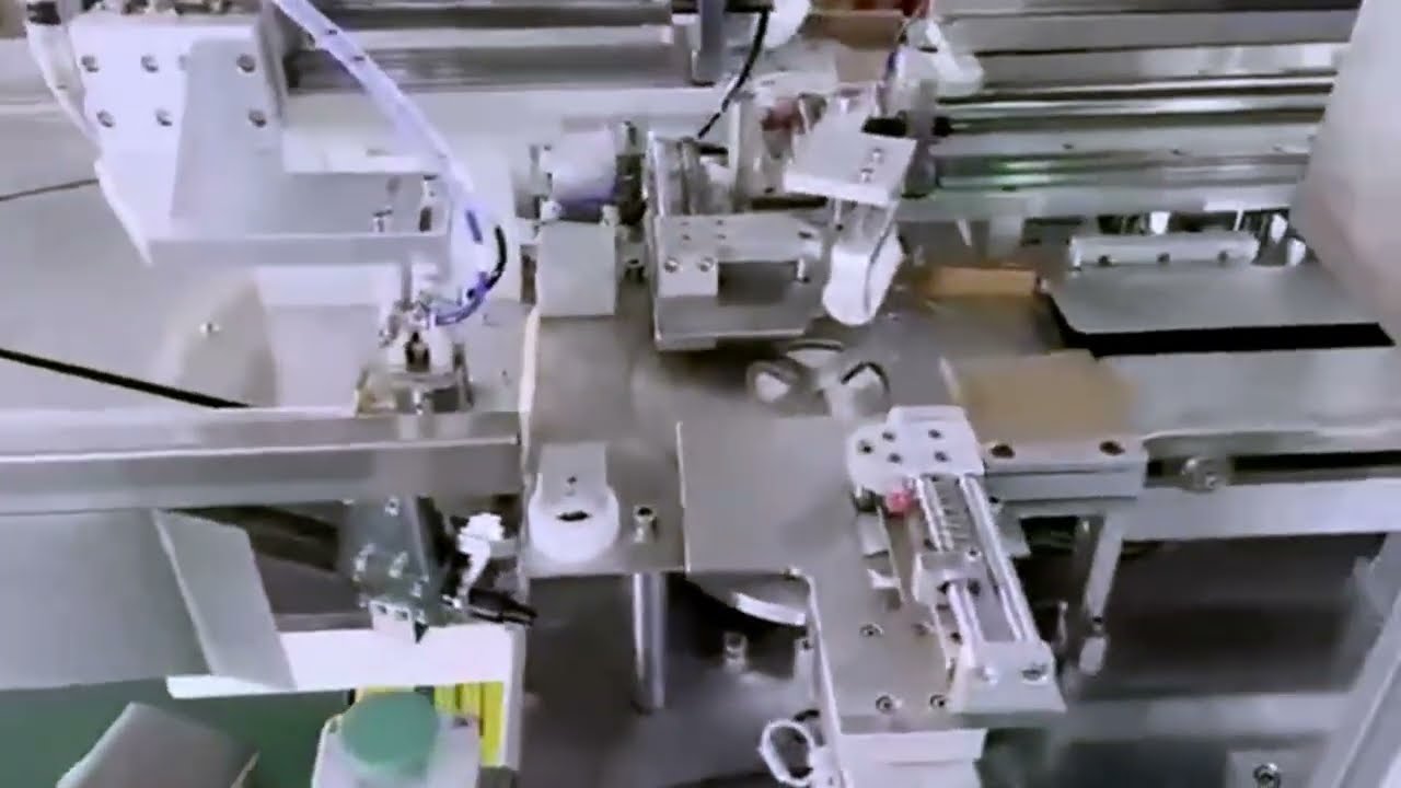 Nasal oxygen cannula packaging machine