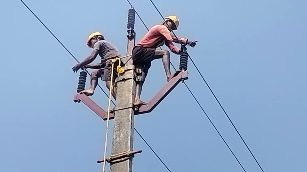 33 kv polymeric pin insulator binding process on 9 mtr long pcc pole of overhead lines