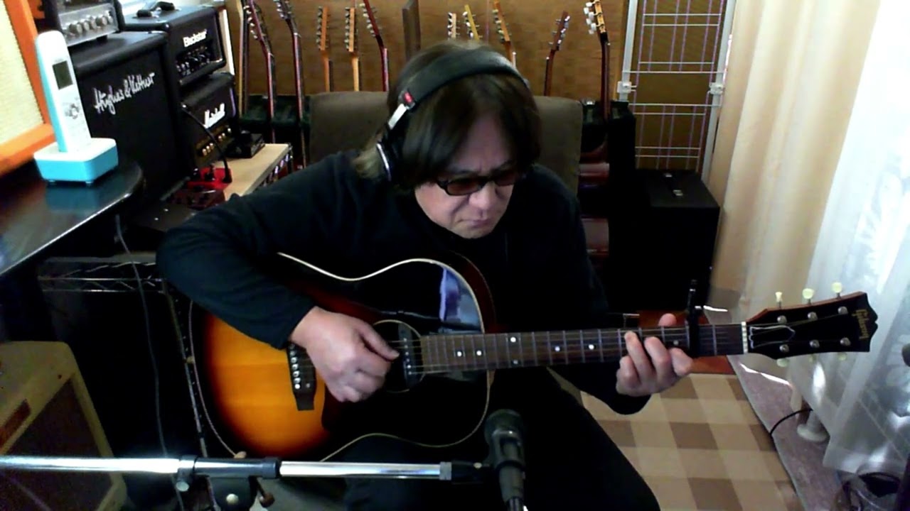 Solo Acoustic Guitar Performance / Song Name 