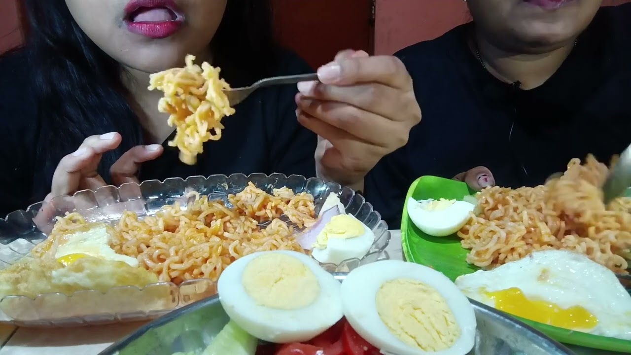 Eating spicy Maggie boiled eggs with lots of green chillies 😋😚