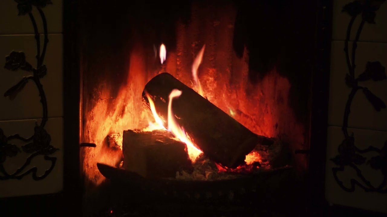 4k Fireplace - THREE HOURS - with gentle crackle and a small amount of surrounding hearth