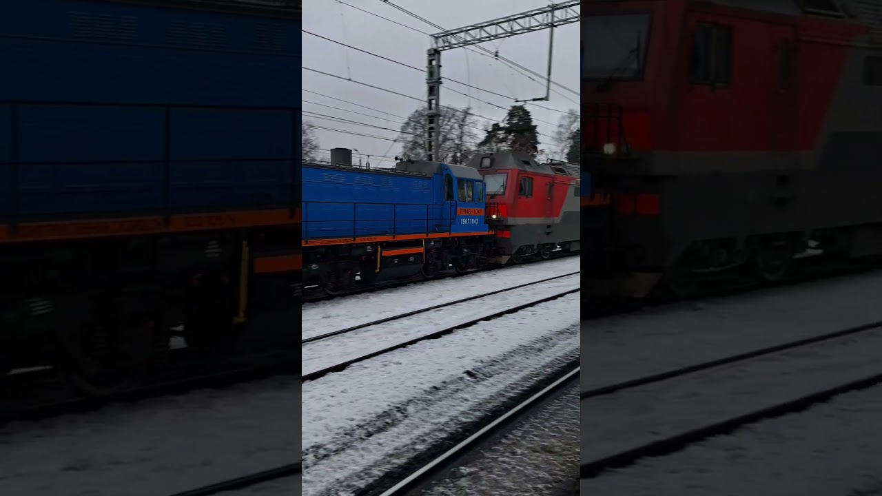 2ЭС6-1512 с перегоняемым ТГМ4Б-1041 и с грузовым поездом следует мимо о.п. Перловская