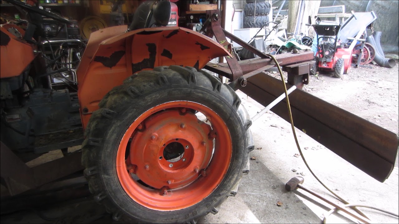 kubota tractor gets junk yard china tires/rims drilled to fit