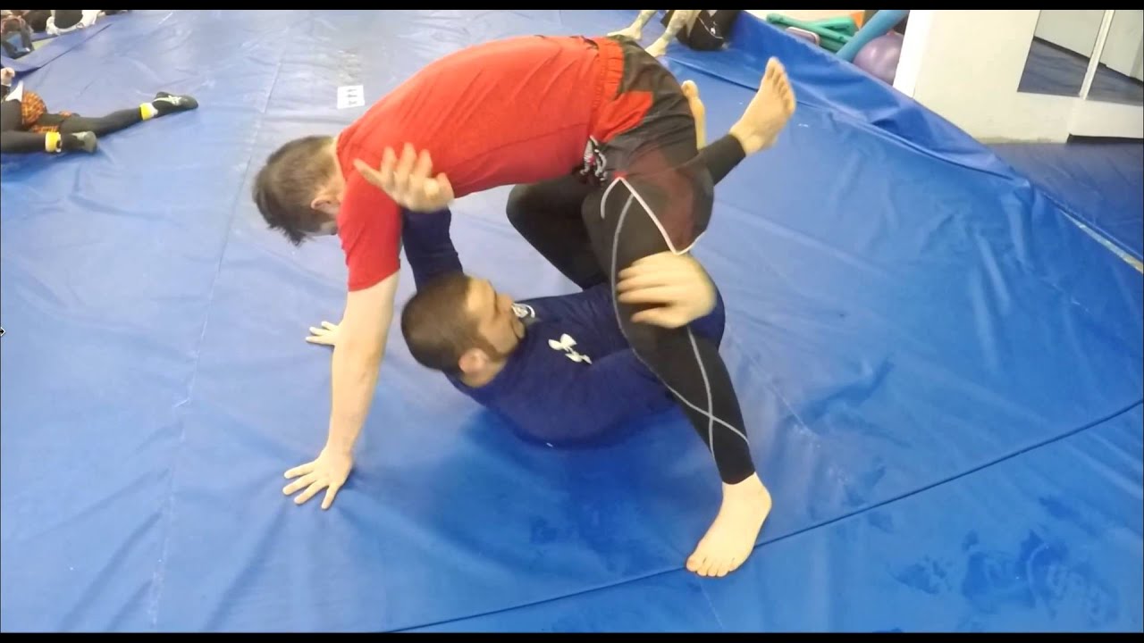 Romulo's Hook Lift to Knee Bar Transition Tutorial - Coach Firas Zahabi