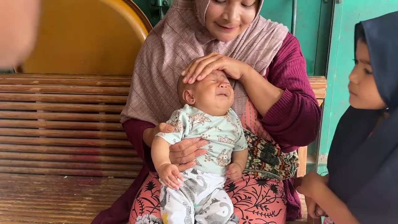 Cryyy!!! Baby ear piercing