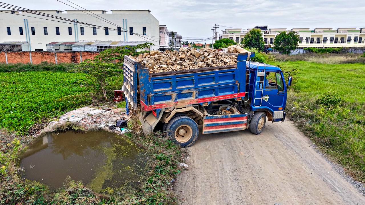 Massive Flooded Landfill Transformed! Dump Truck Unloading Stone with Komat'Su D20P Dozer