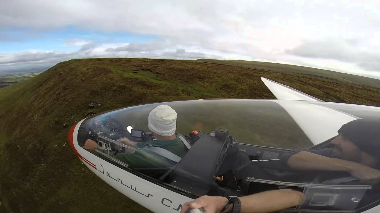 Black mountains gliding in a Janus and DG101