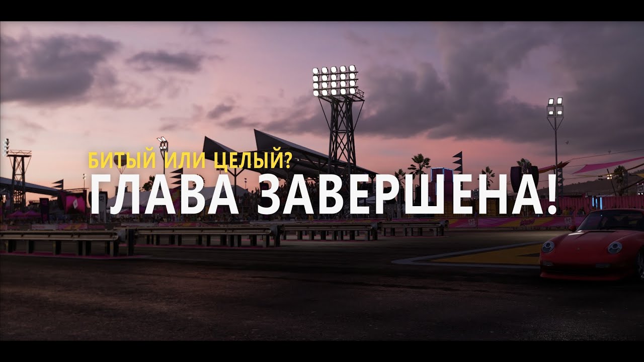 Кошка в костюме акулы играет в Forza Horizon 5.  
