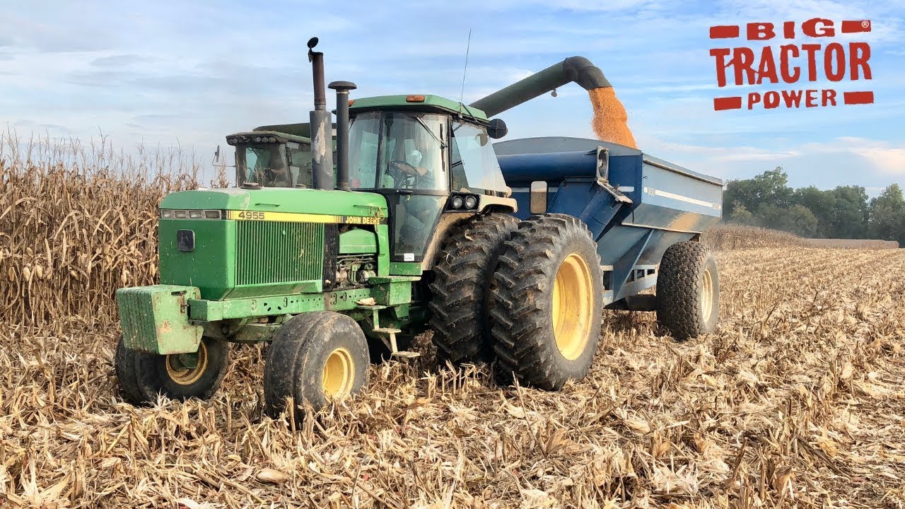 2wd John Deere 4955 on Grain Cart Duty with a Kinze 640