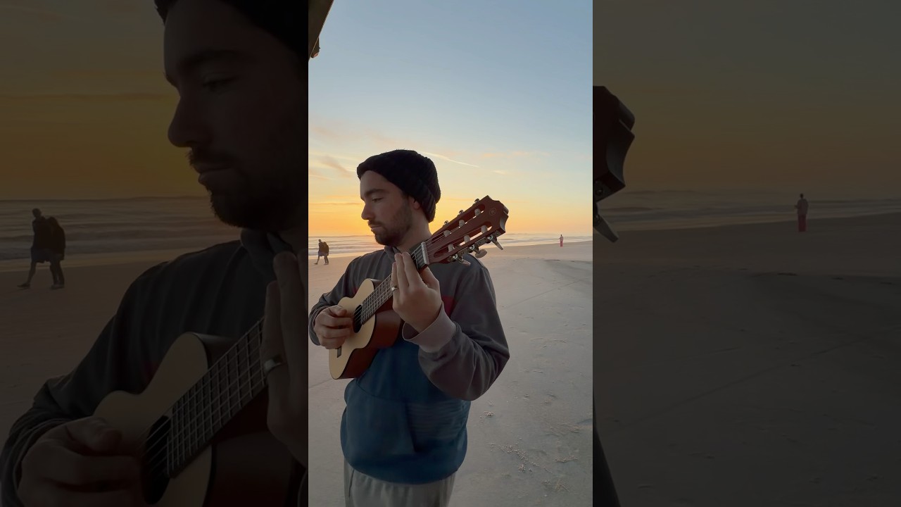 Jack Johnson Upside Down on the beach at sunrise 