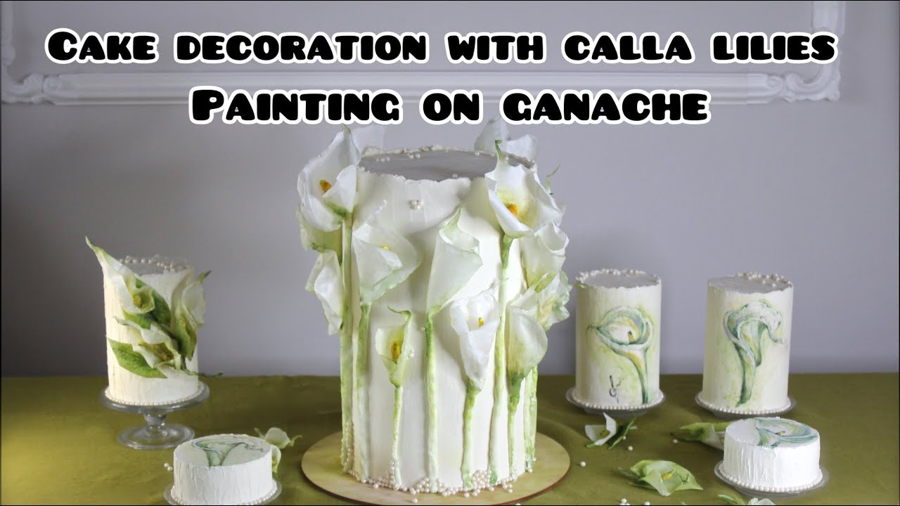 Cake decoration with calla lilies.Mini-cake with calla lilies. Painting on ganache