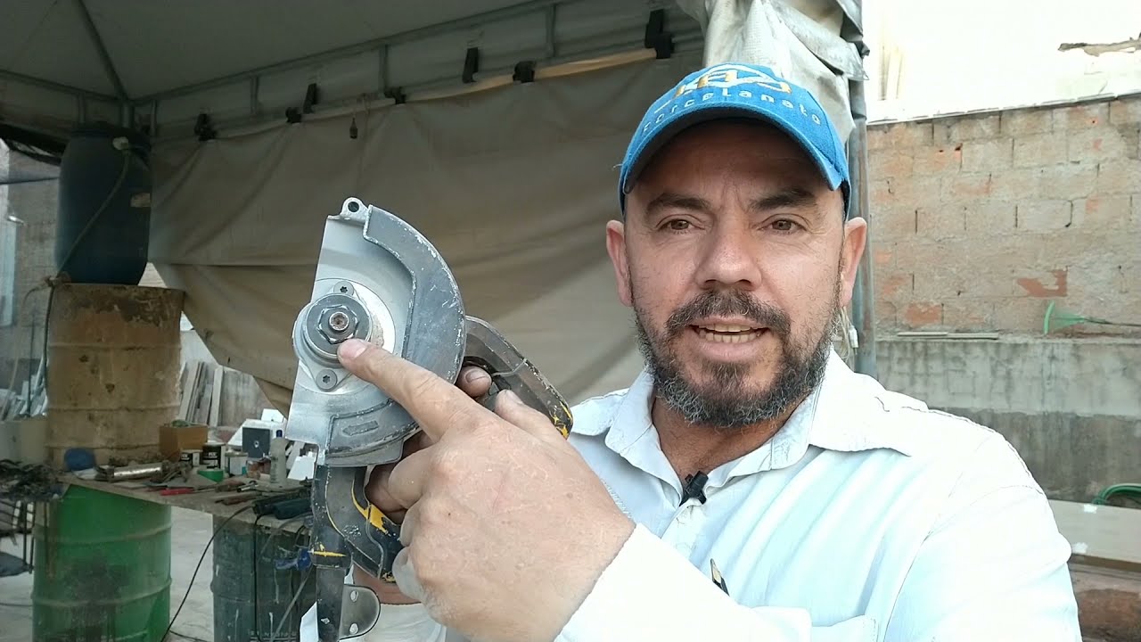 como trocar o disco da serra mármore .