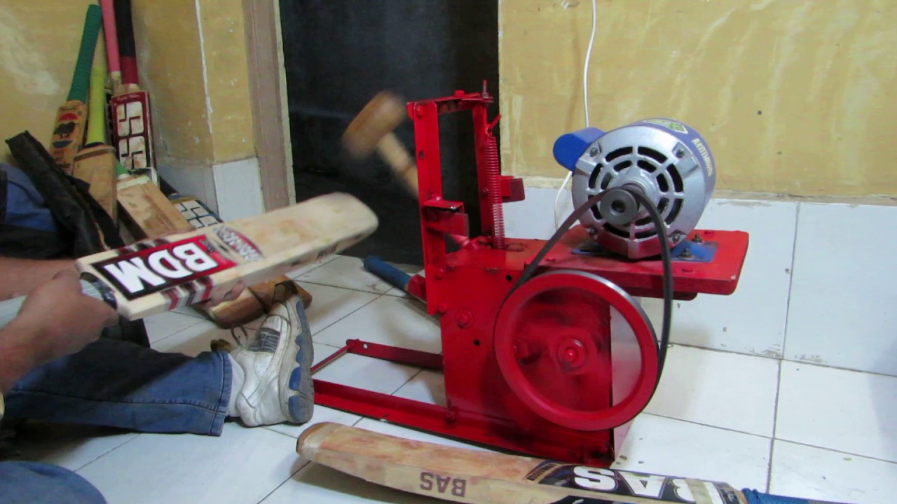 Bat knocking machine