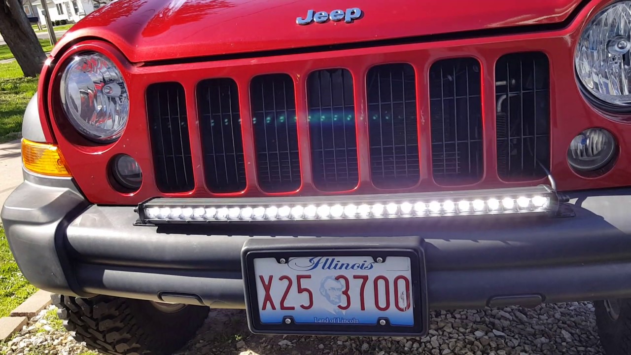 07 jeep liberty new tires, headlights and a  rough country led light bar
