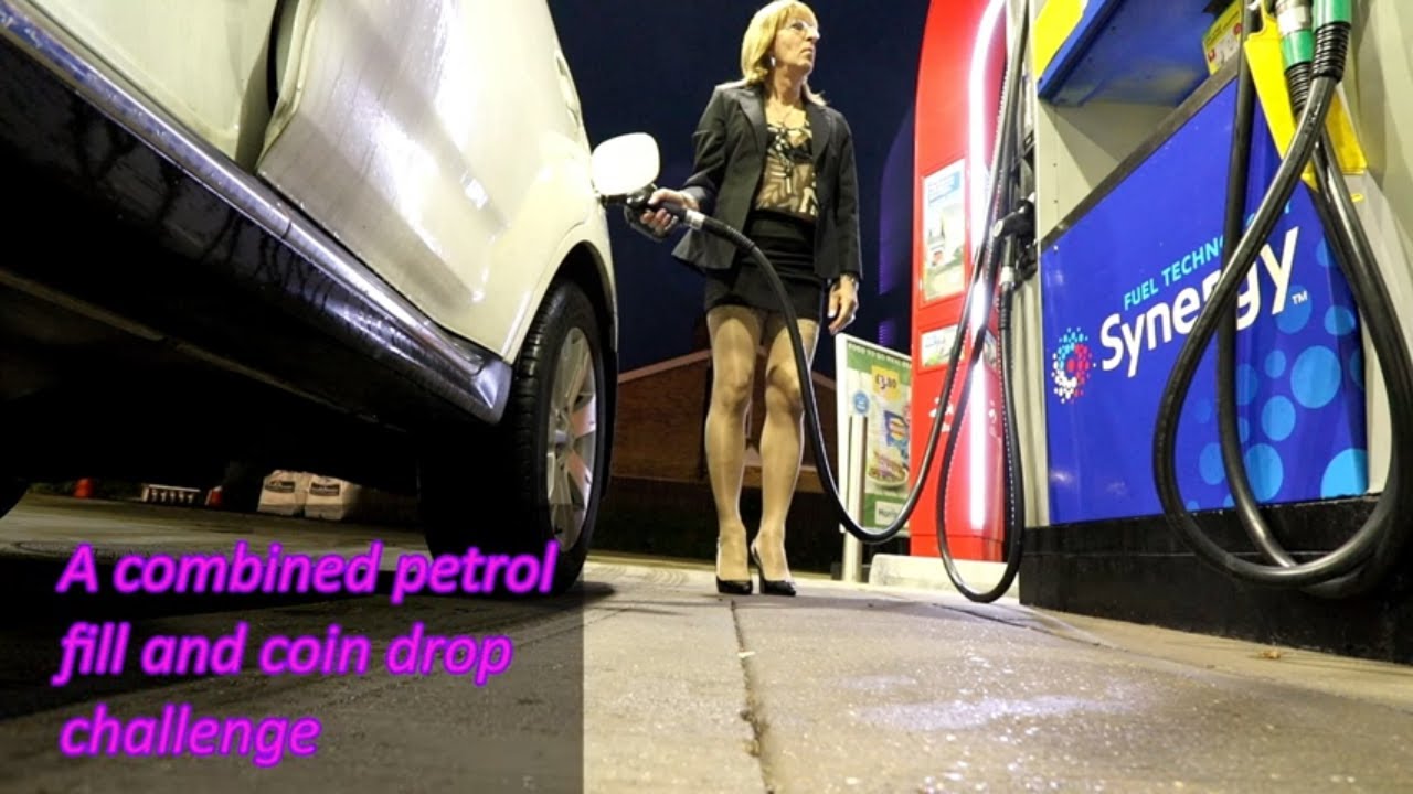 Petrol Fill and Coin Drop in Miniskirt and Stilettos
