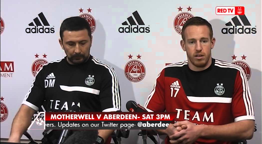 Aberdeen unveil new signing Adam Rooney
