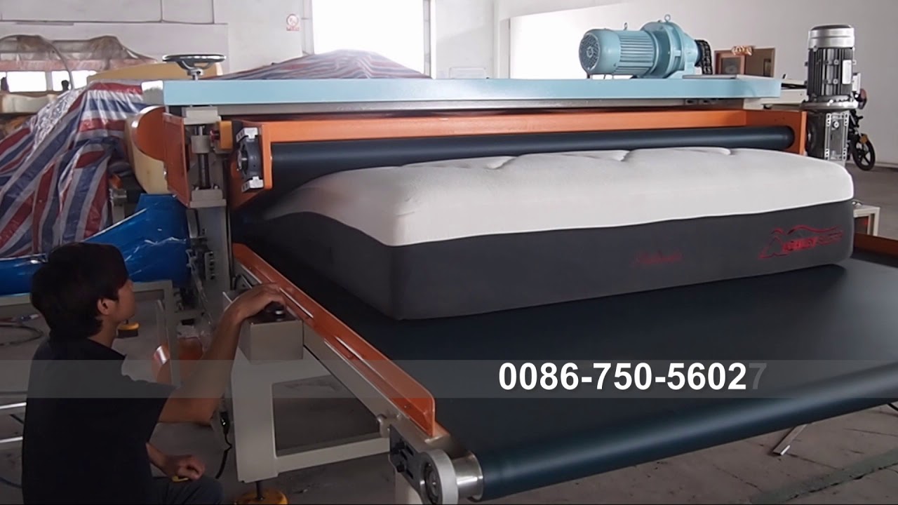 Mattress roll packing machine