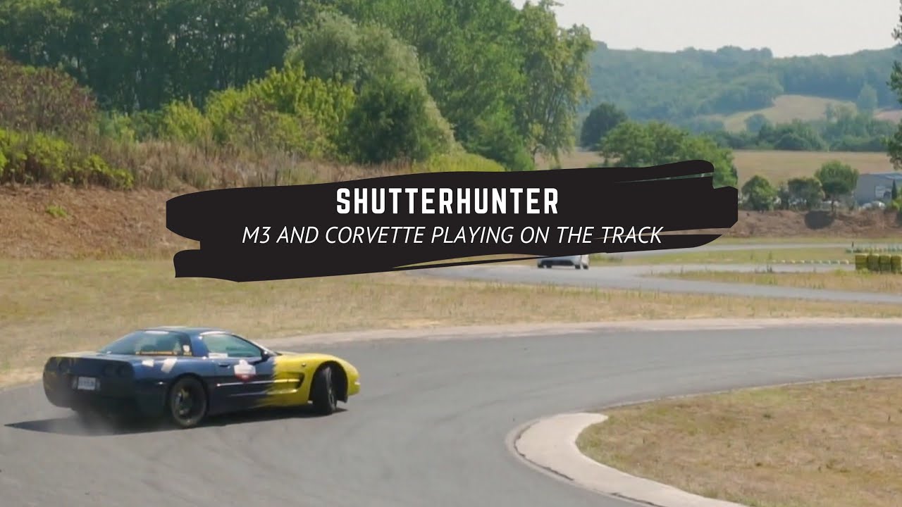 M3 and Corvette playing on the track