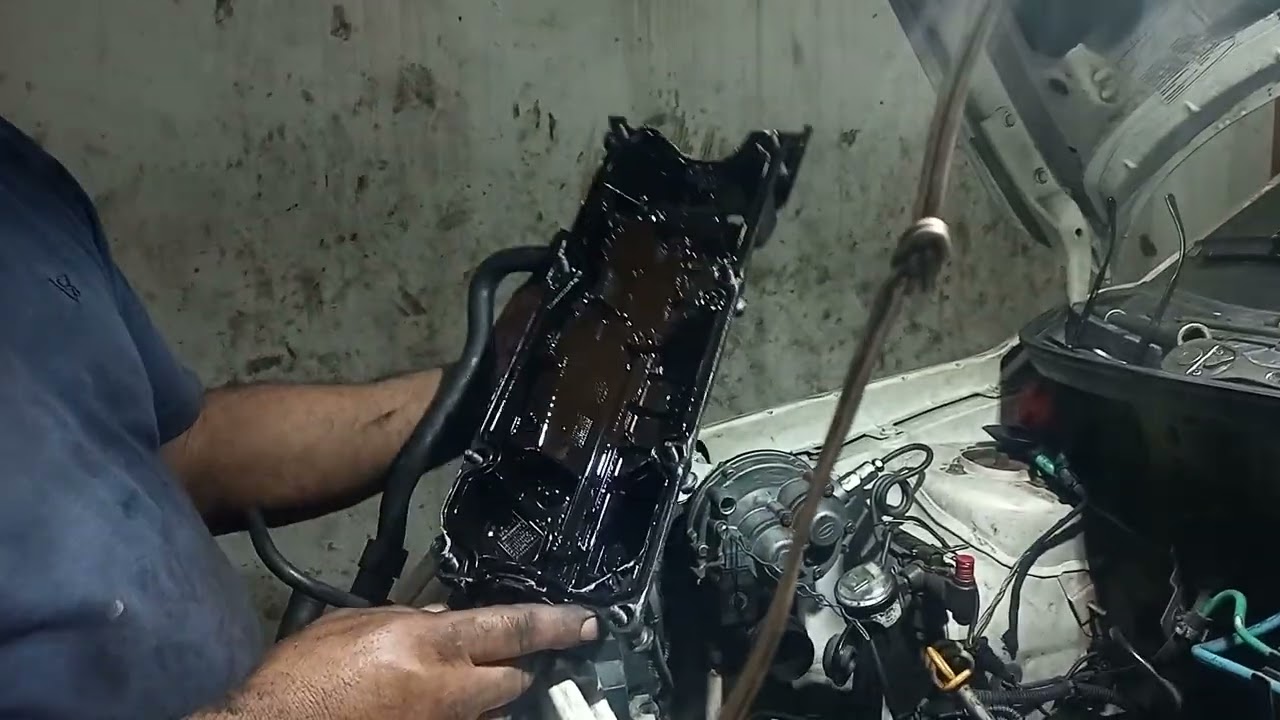 tirando vazamento da tampa do tucho motor evo 1.4 Fiorino