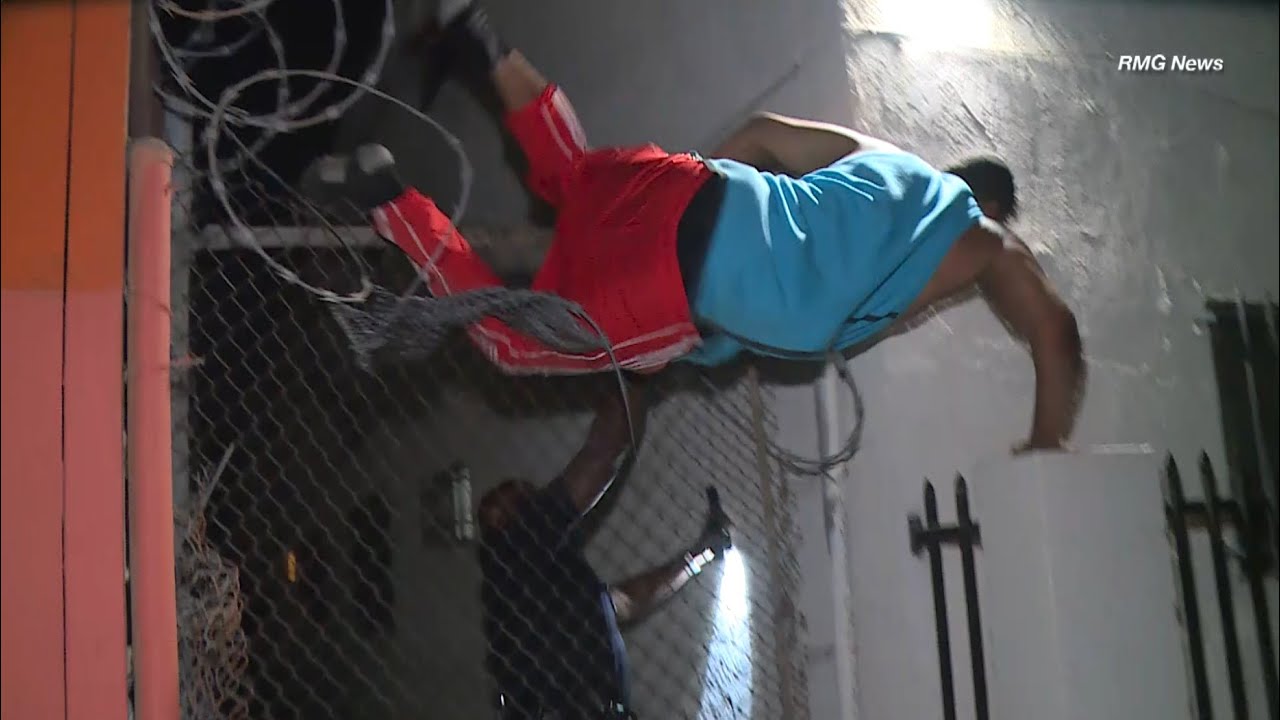 Crazy Pursuit Crash Caught on Camera...Suspect Scrambles Through Barbed Wire to Get Away!