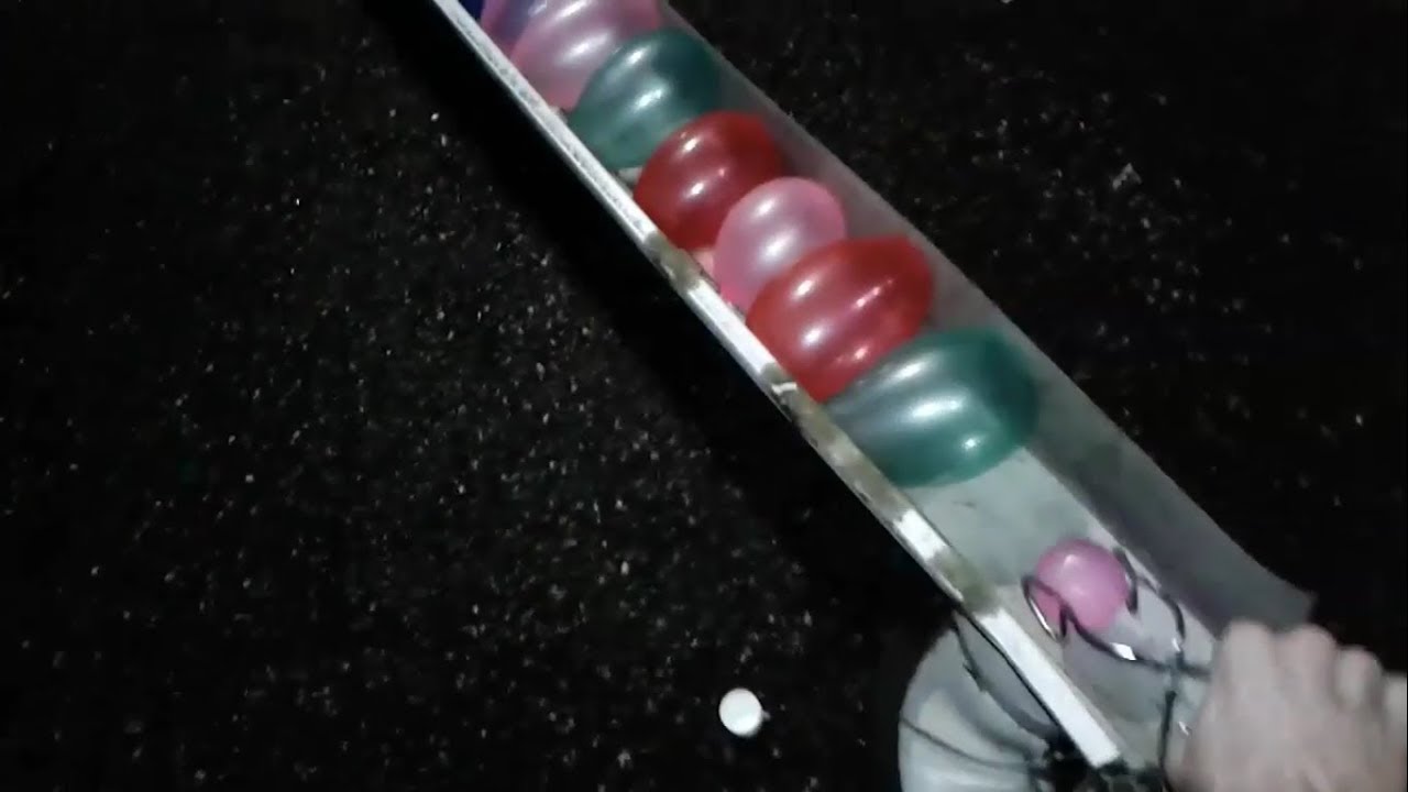 Glowing 1000 degree ball vs line of balloons