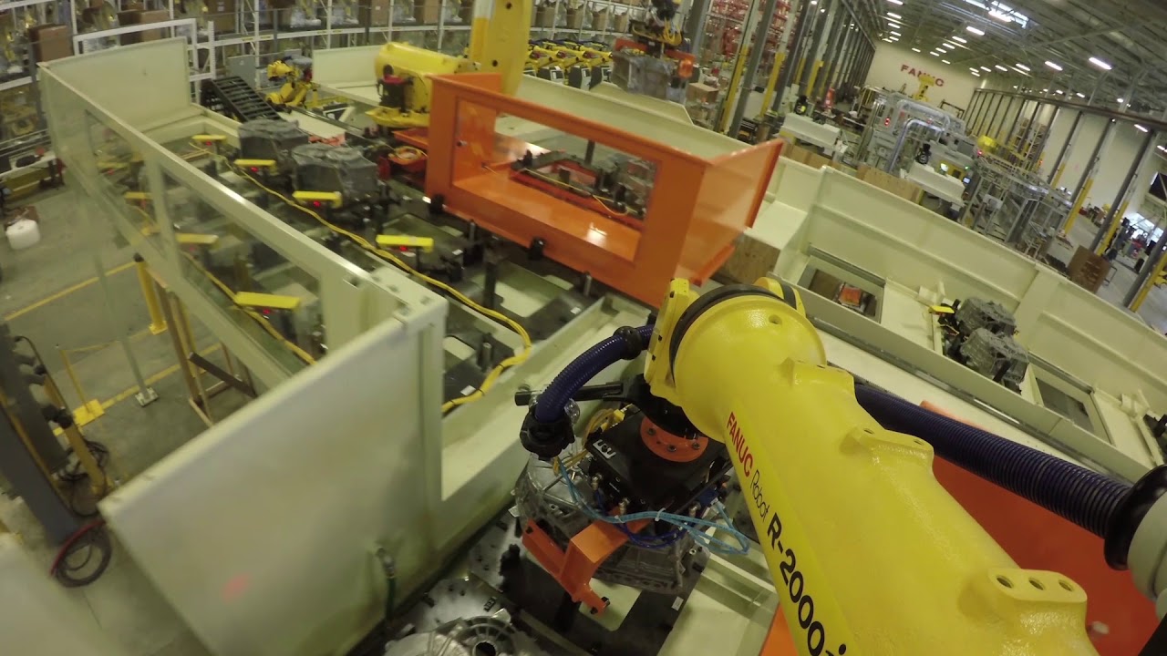 Overhead Robotic Machine Tending System with Modular Robot on Rail (RoR) Layout – FANUC America