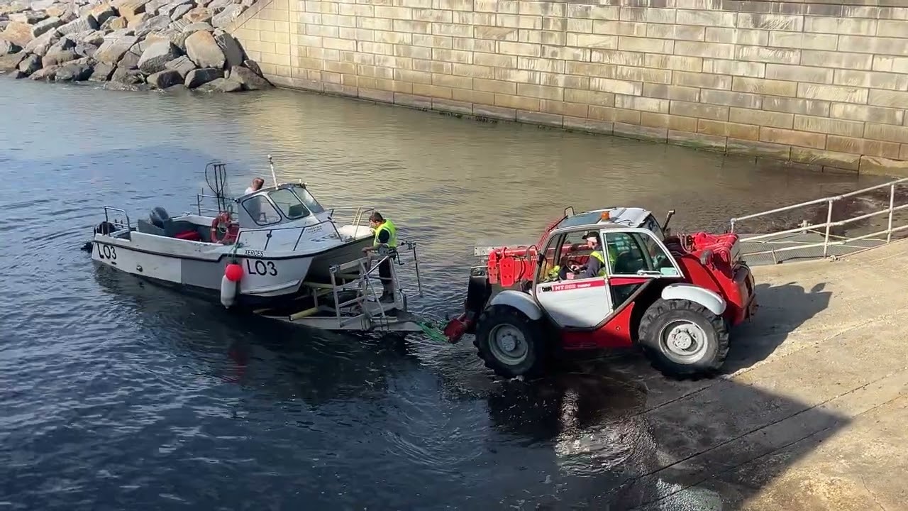 Smooth boat launch by Cheetah Marine into Ventnor Harbour, Isle of Wight