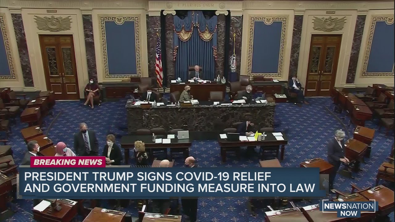 Trump signs coronavirus stimulus package and government-funding measure