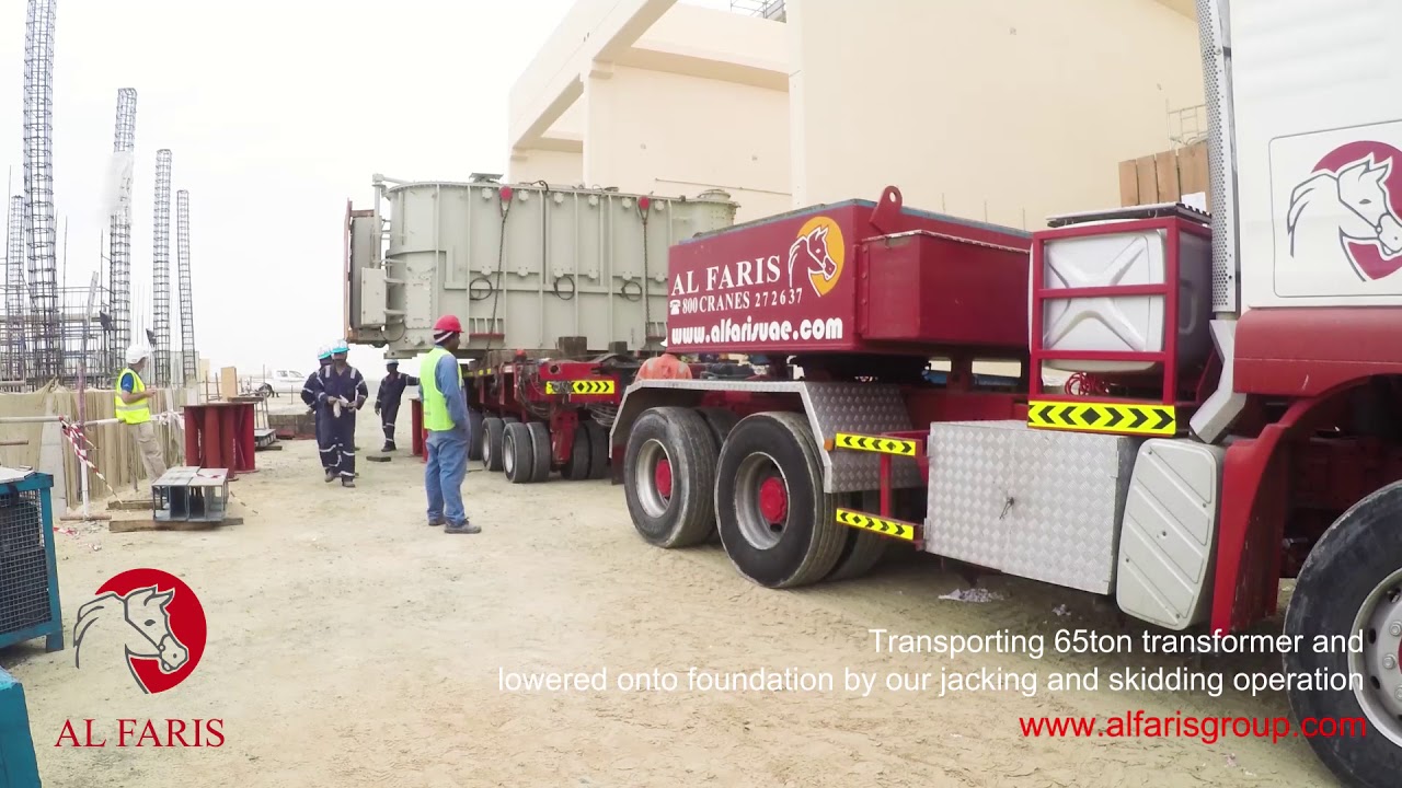 Transporting 65ton transformer and lowered onto foundation by our jacking and skidding operation