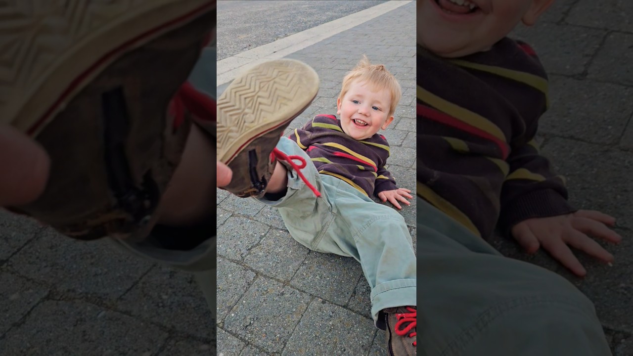 Funny kid removing his shoes and walking barefoot #son #father #cute #smile #boy #happy