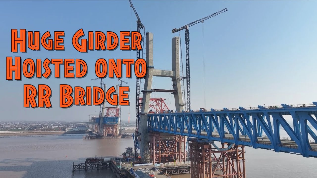 See how giant girder being hoisted onto key road-rail bridge over China’s Yangtze River
