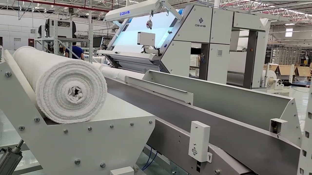 R.401.50 FABRIC INSPECTION & ROLLING MACHINE and PK.750 FULL AUTOMATIC FABRIC ROLL PACKAGING MACHINE
