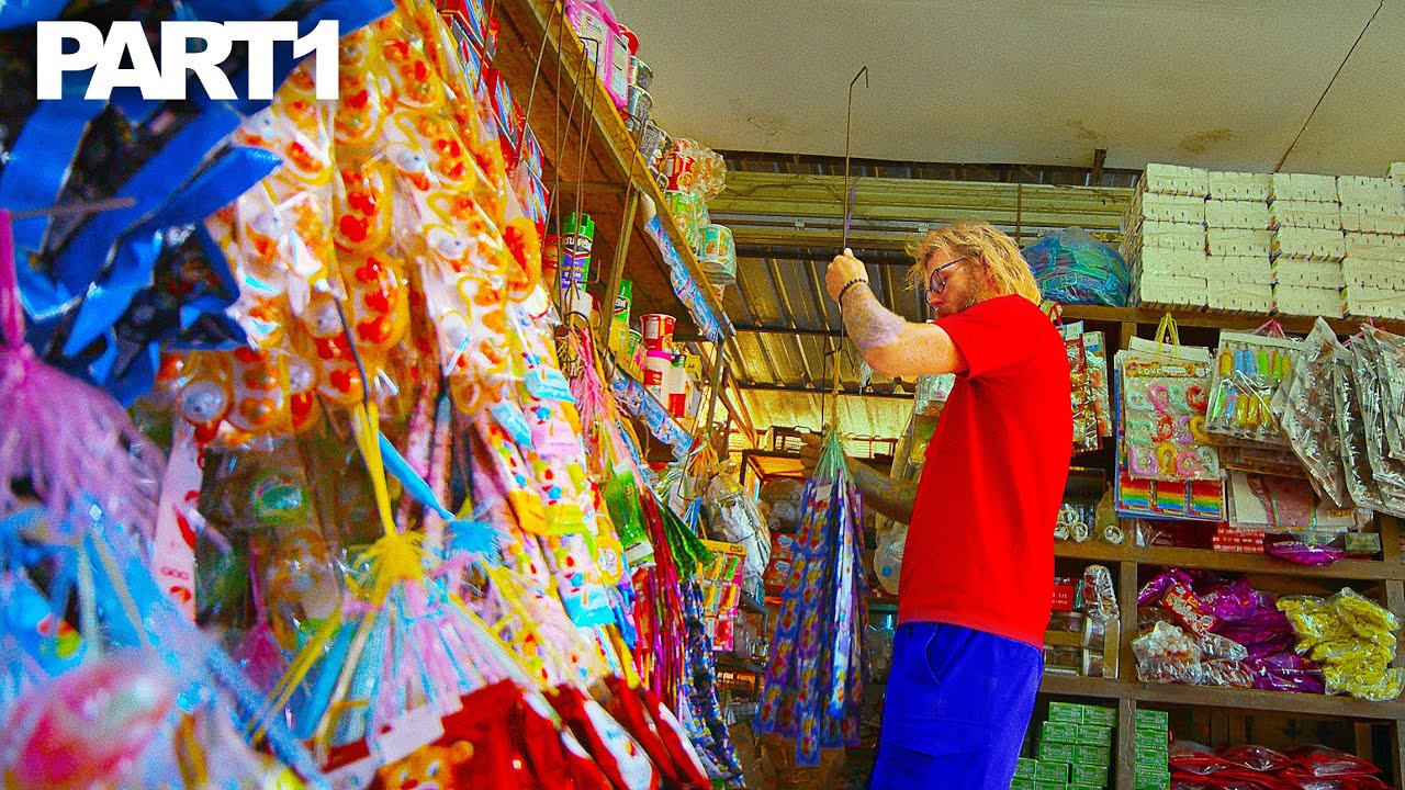 Helping out at the small village market and local Lao girl shows me around! Kenue Kang! LAOS! PART 1