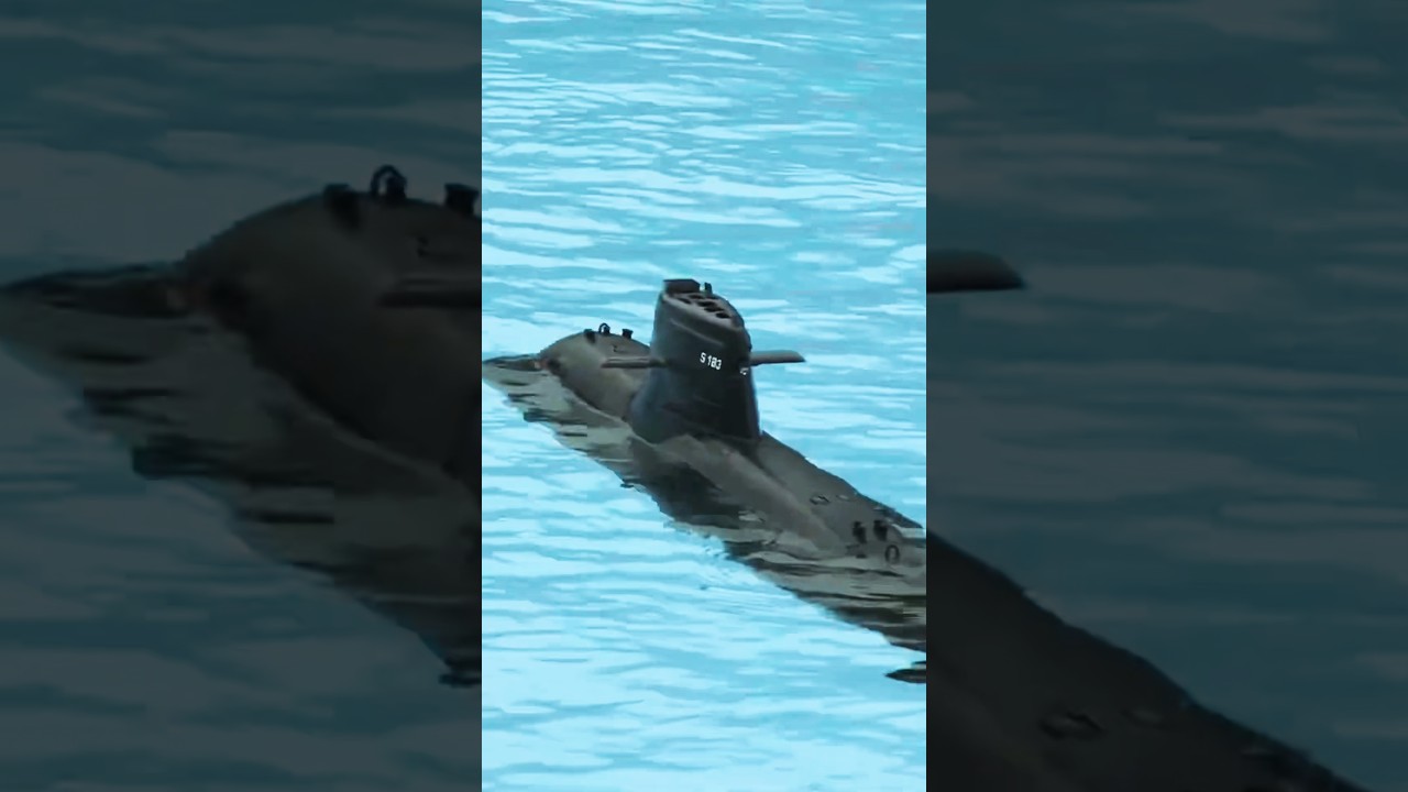 Submarine Comes Face-to-Face with Cargo Ship!