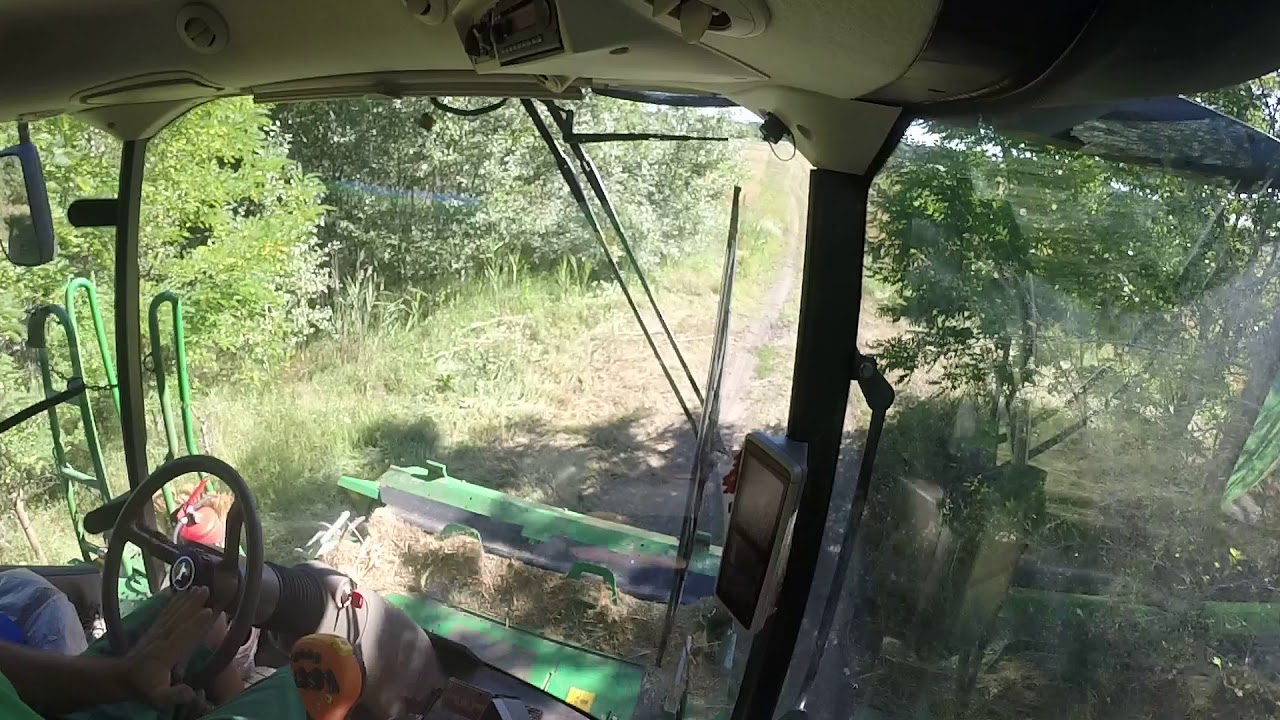John Deere T550 vonulás