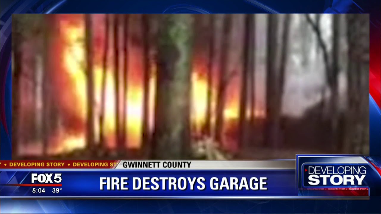 Cobb County firefighters battle massive house fire