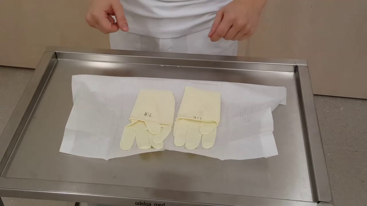 Anziehen steriler Handschuhe