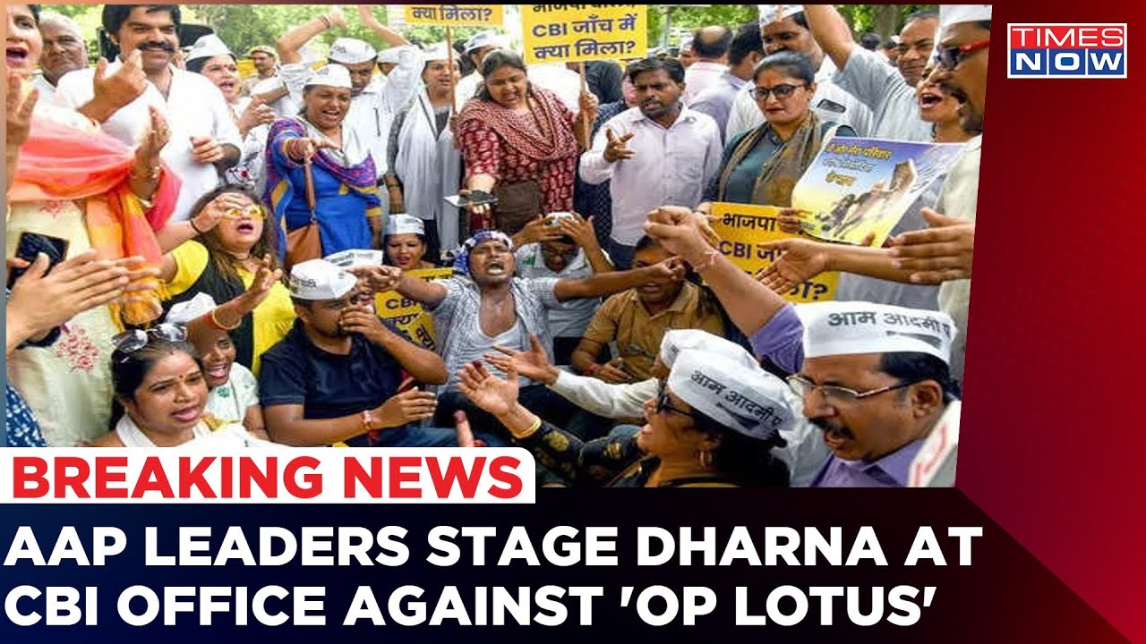 AAP Leaders Stage Dharna At CBI Office 'Probe BJP's Lotus Demand' | AAP Vs BJP | English News