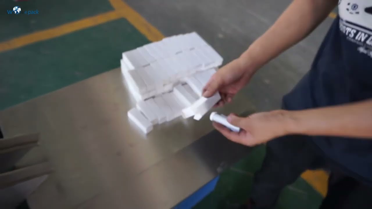 Small Box Packaging Machine in Action Tubes, Inserts, Sealed